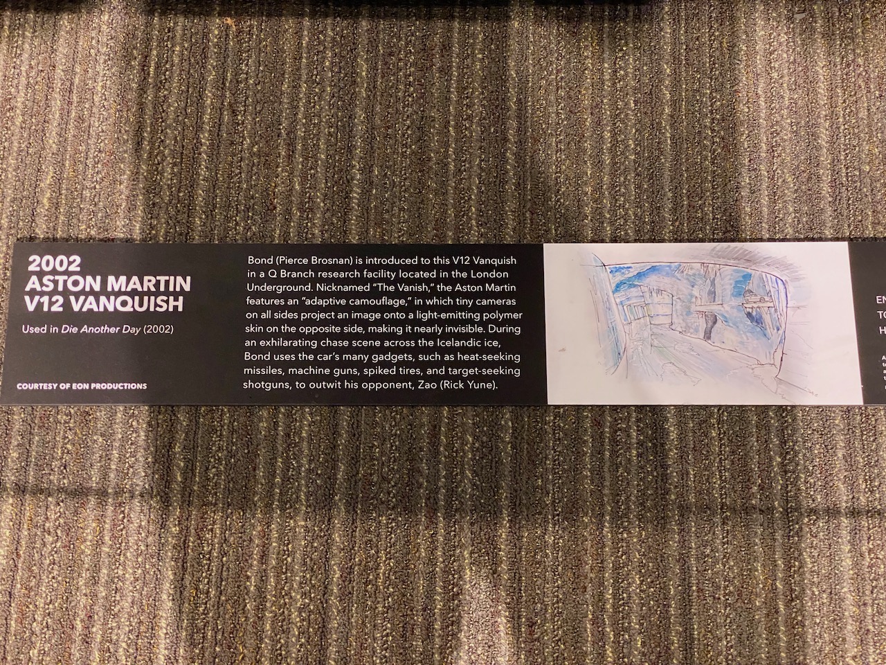 saratoga spa - 2002 aston martin v12 vanquish sign